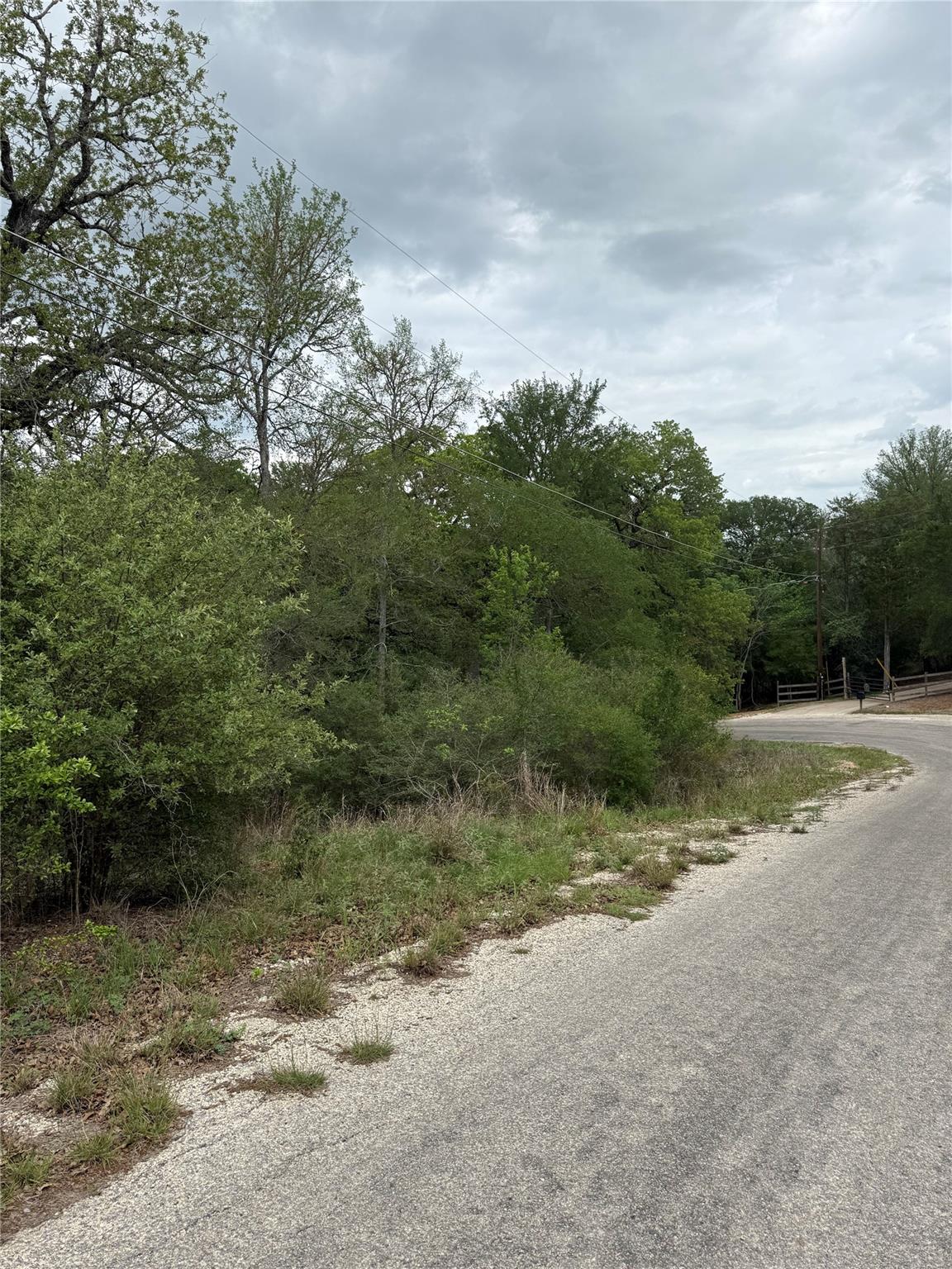 The property features a paved road along its edge