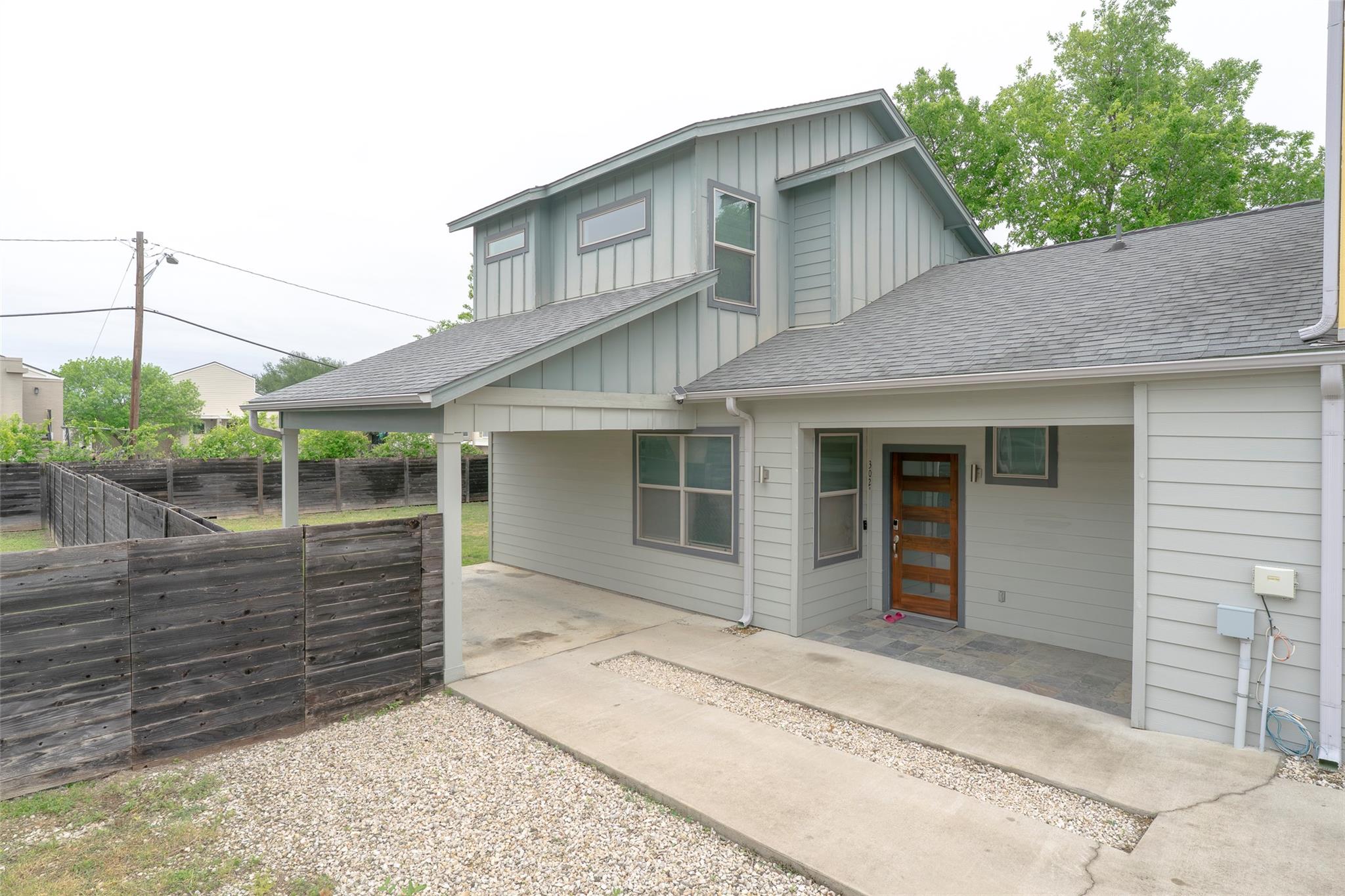 View of front of property featuring board and bat