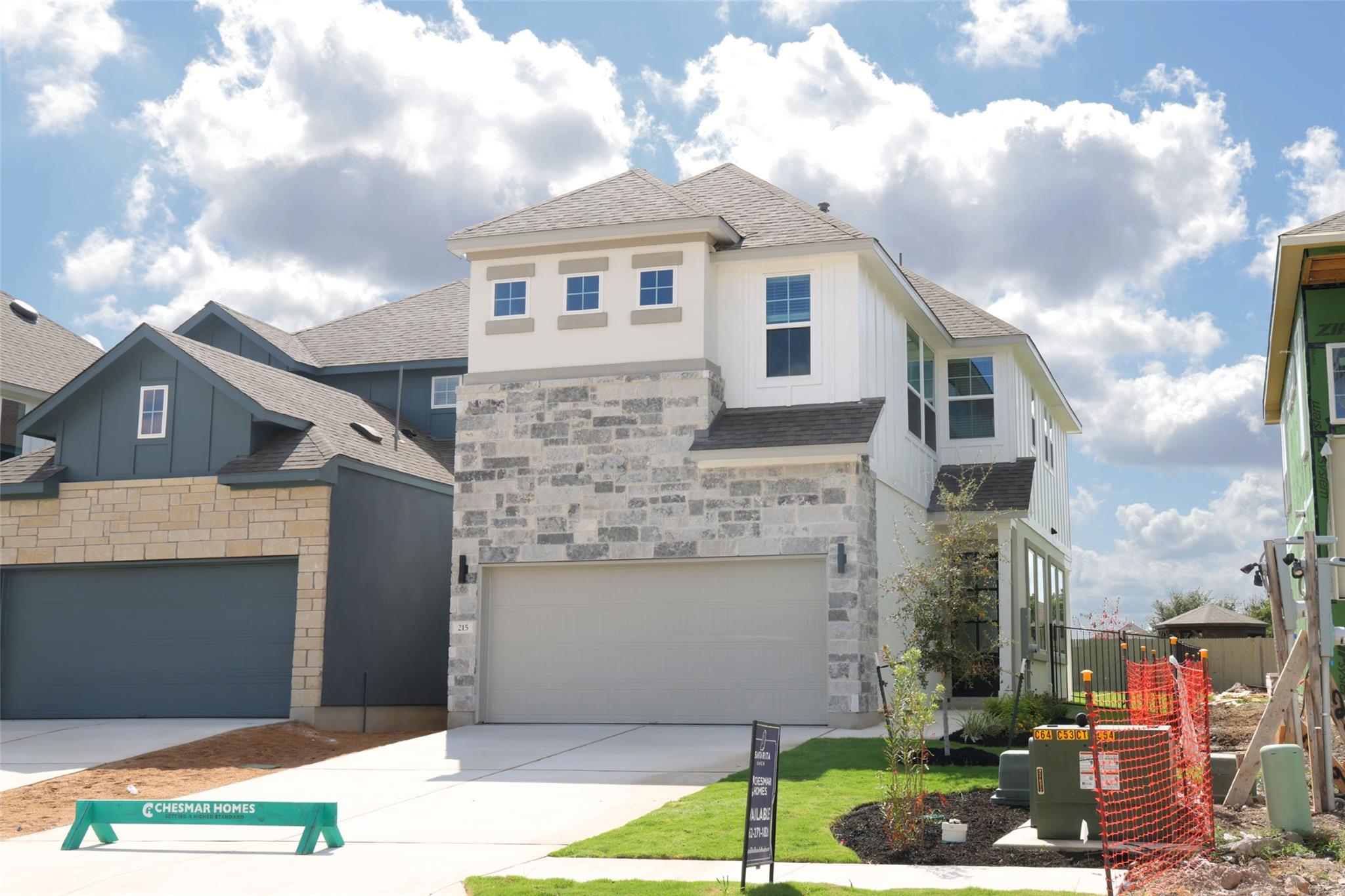 A modern two-story exterior features a striking c