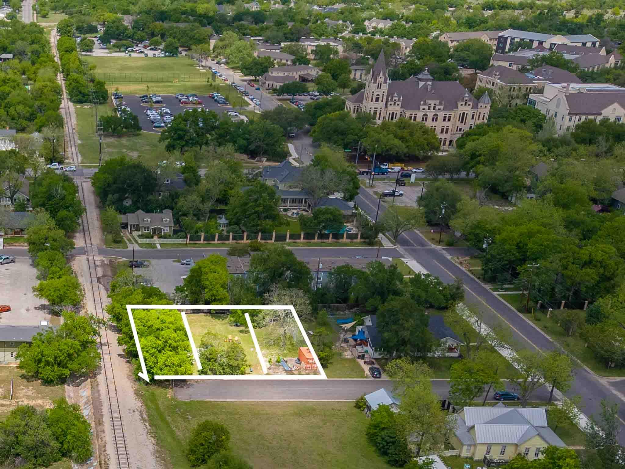 Expansive lot with mature trees, offering a signi