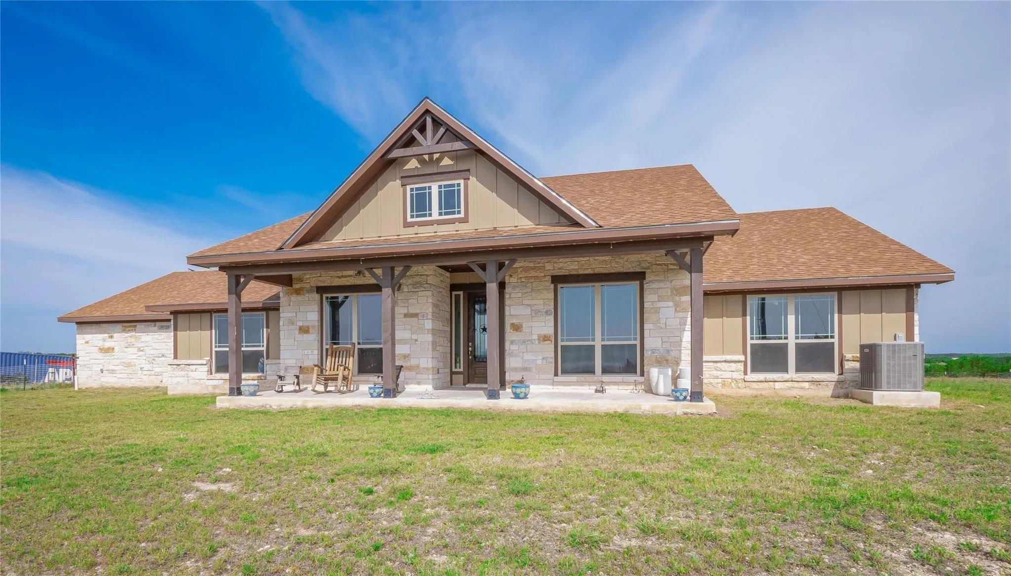 Craftsman-style home featuring a stone and siding