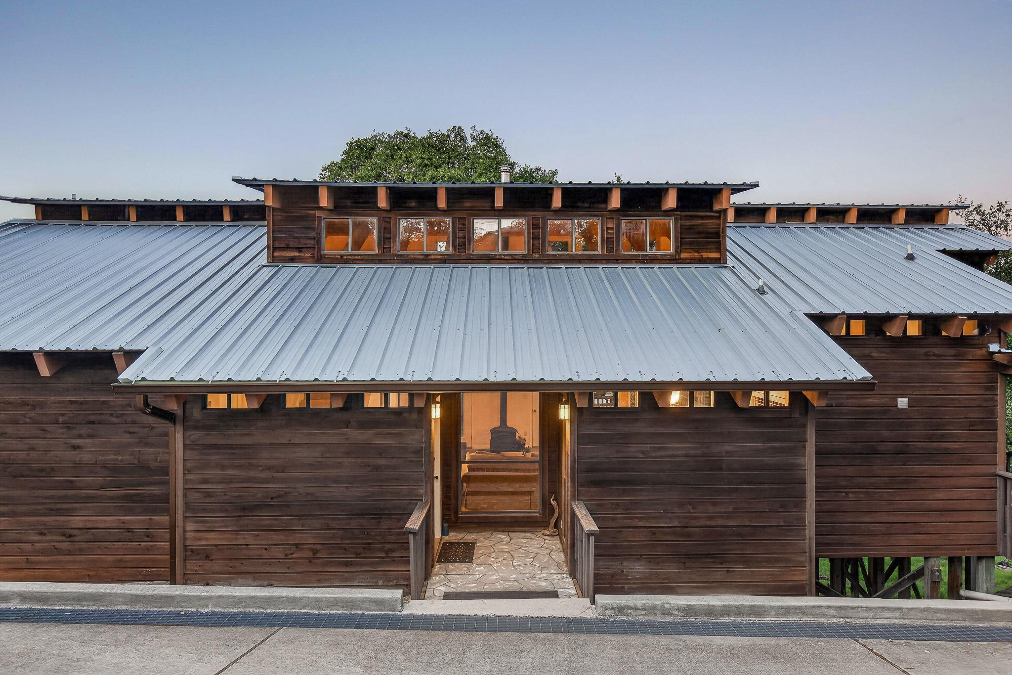 The property features a wood exterior with a mult