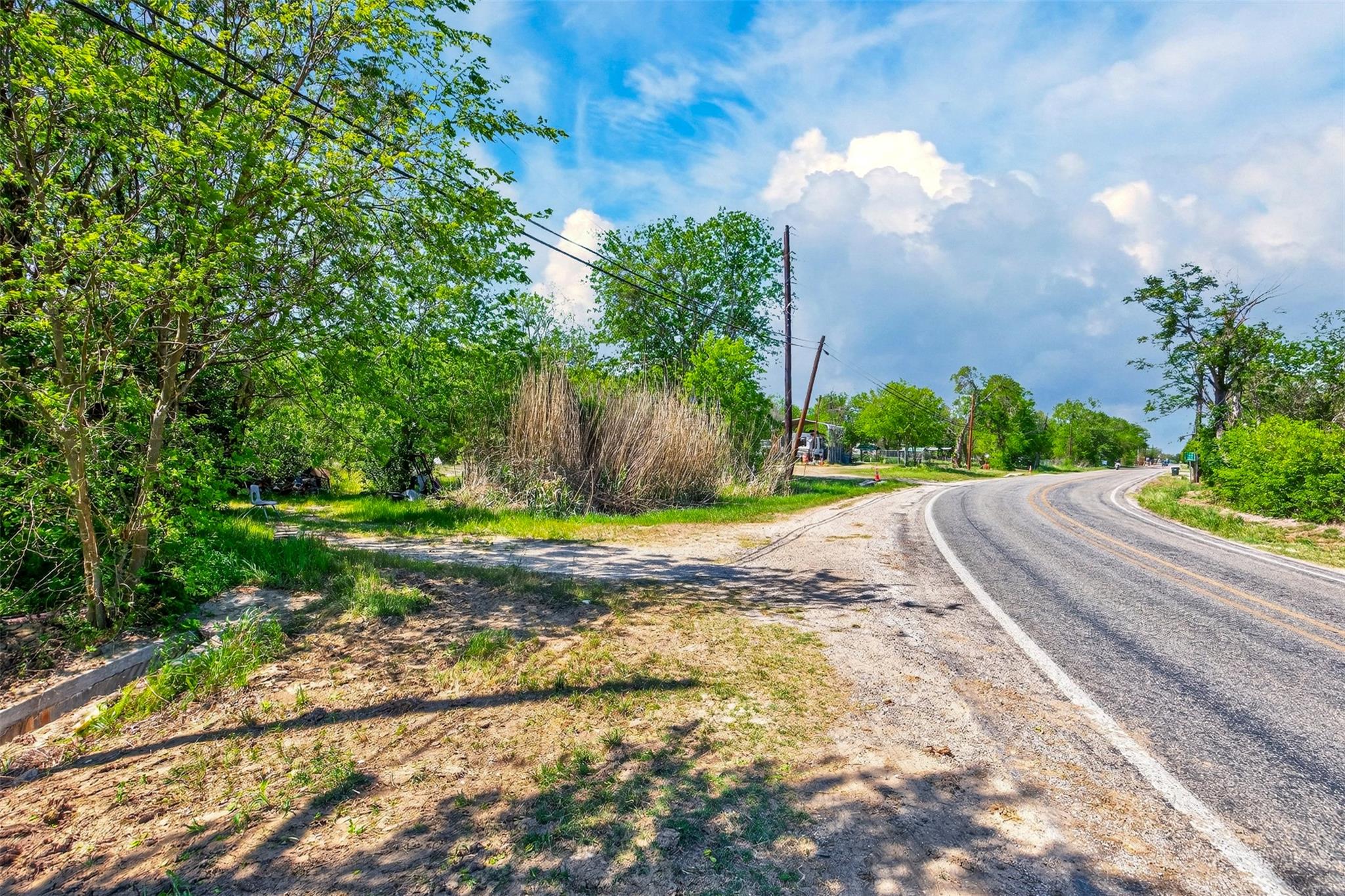The property features a rural setting with a pave