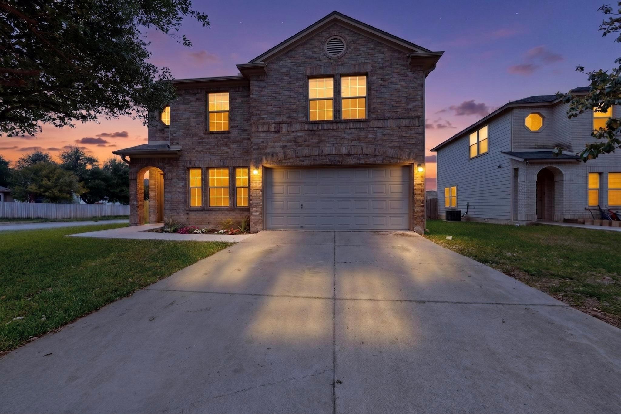This property features an inviting brick facade, 