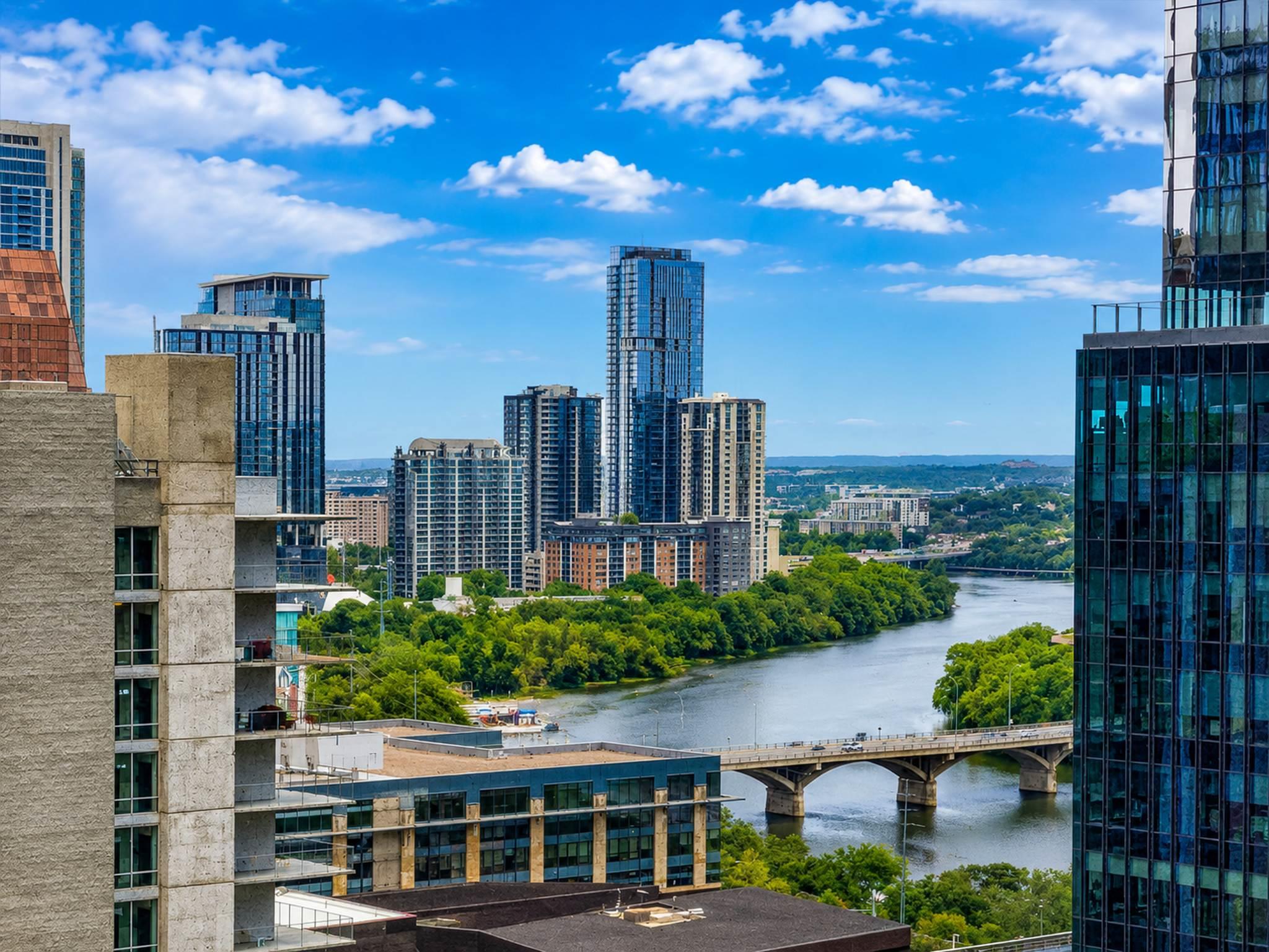 Panoramas of the winding river and city skyline c