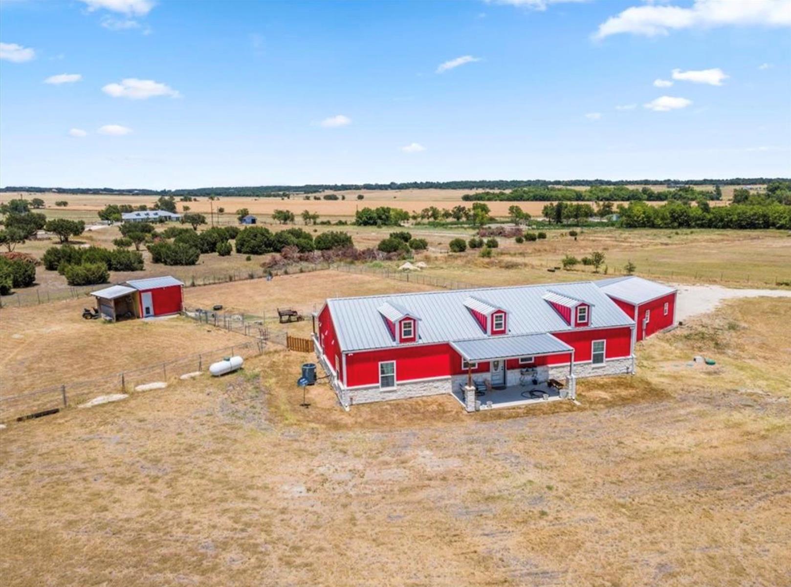 The property features a striking red exterior wit