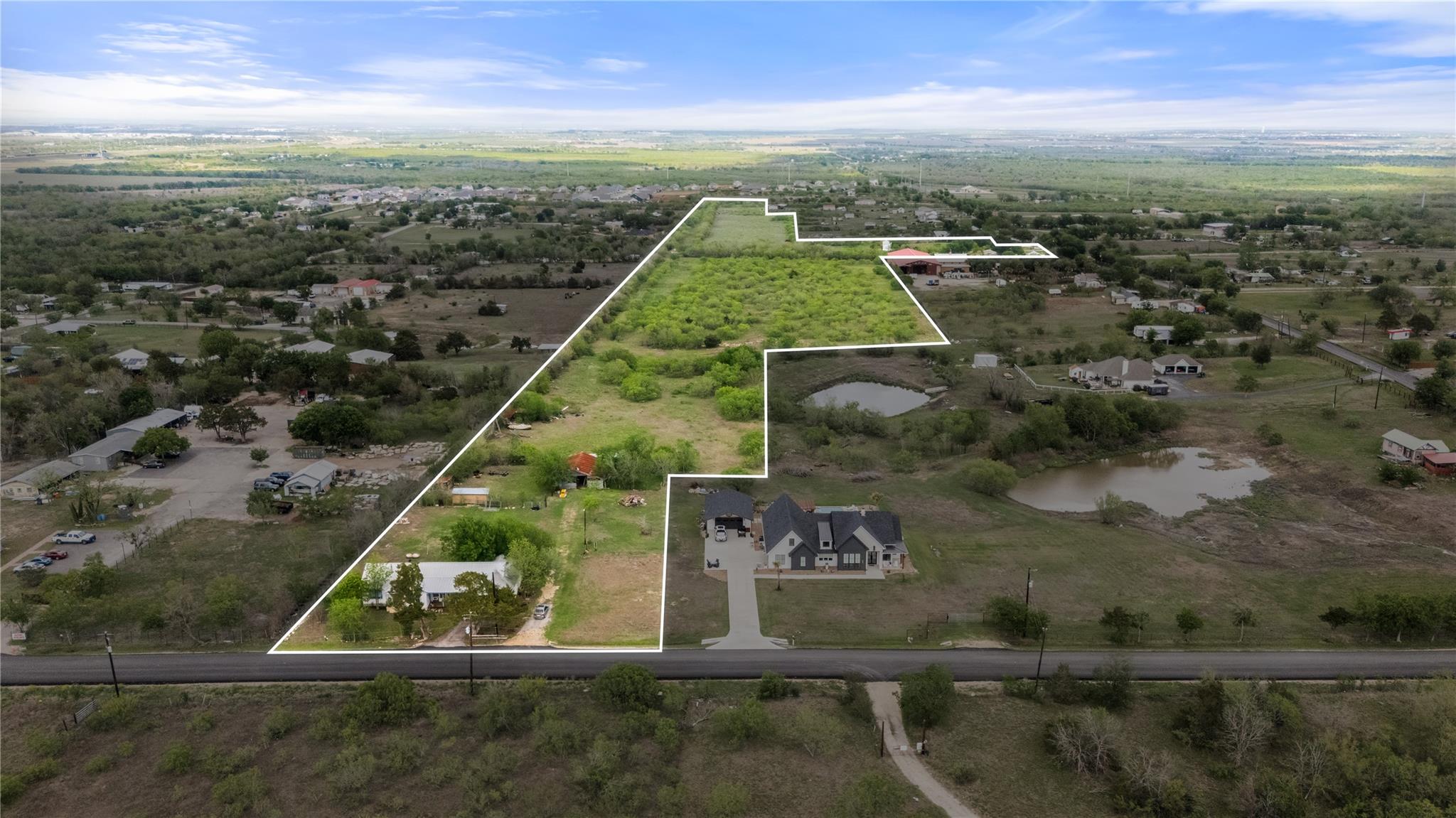 Expansive land parcel featuring multiple structur