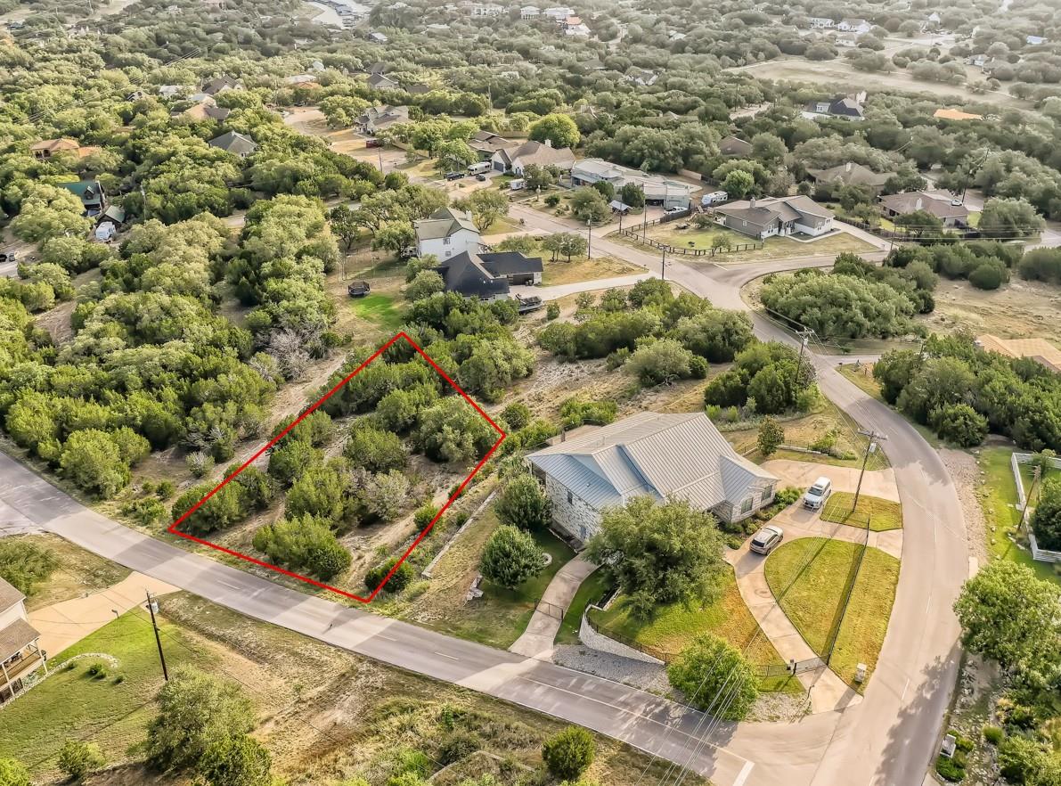 Expansive land parcel featuring natural shrubbery