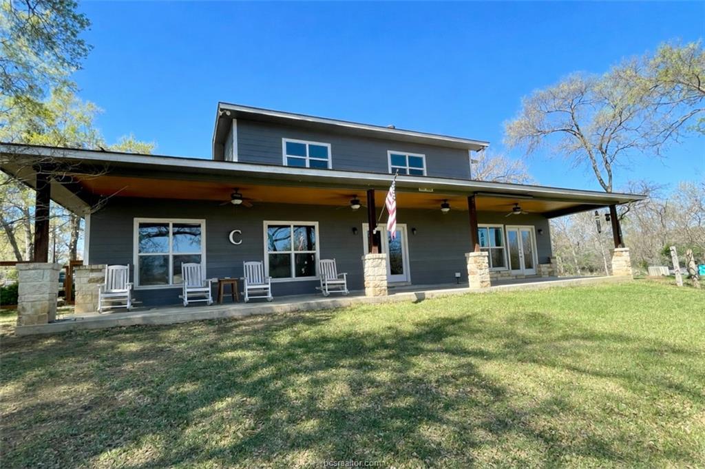 The property features a dark gray exterior with a