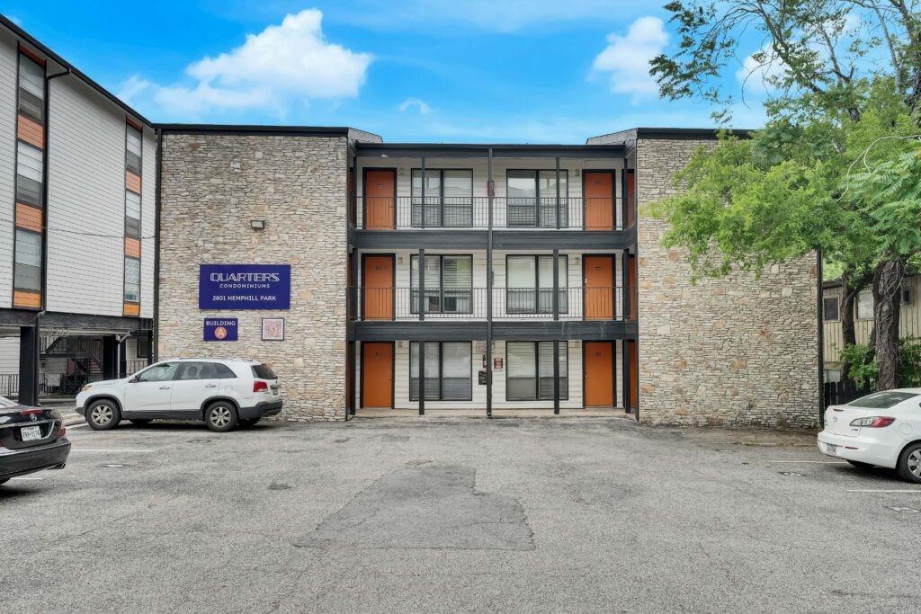 The property features a three-story exterior with
