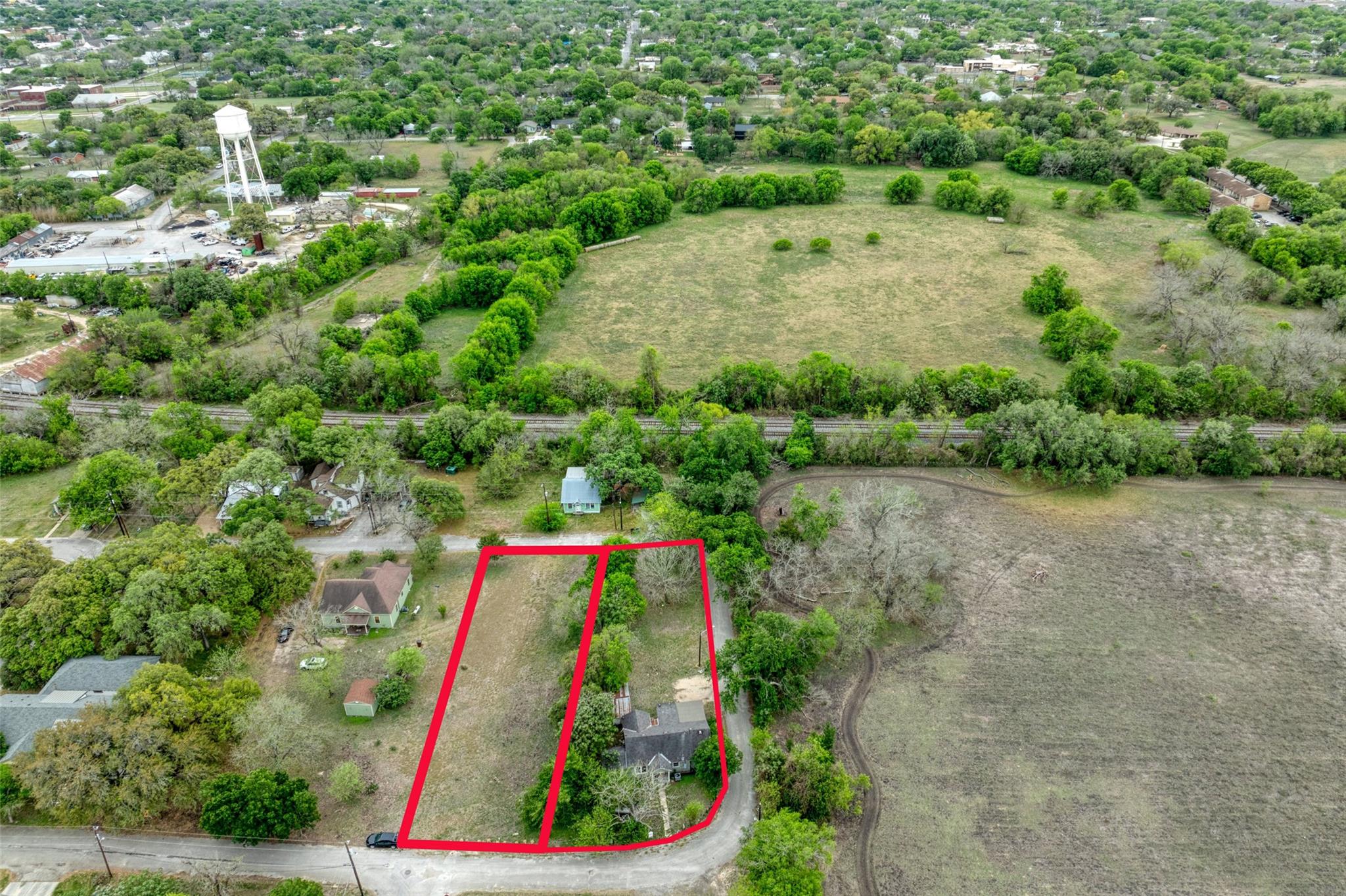 Aerial view of the property, featuring a resident