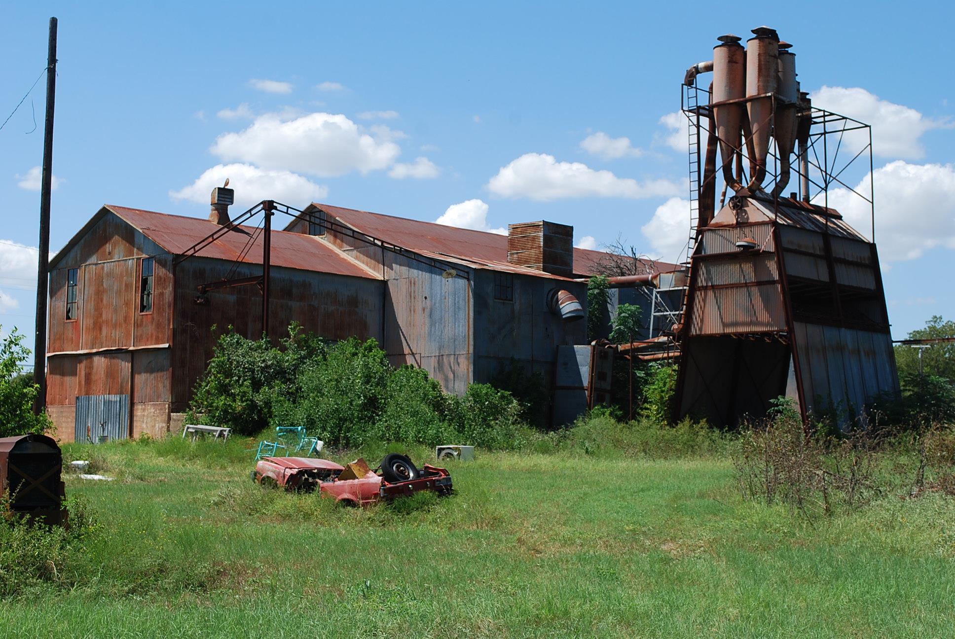 Industrial structure featuring corrugated metal s