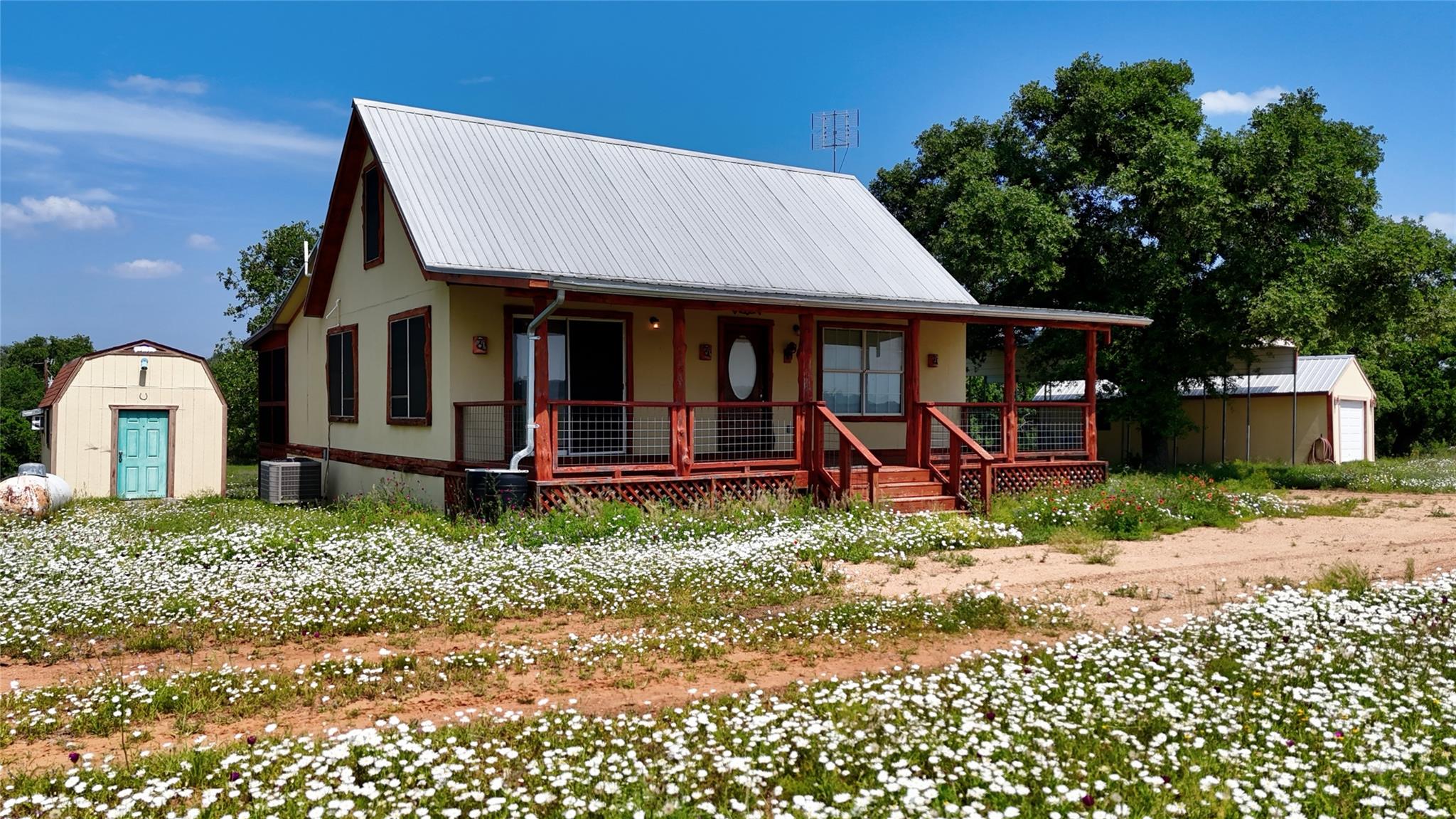 A charming dwelling with an inviting covered porc