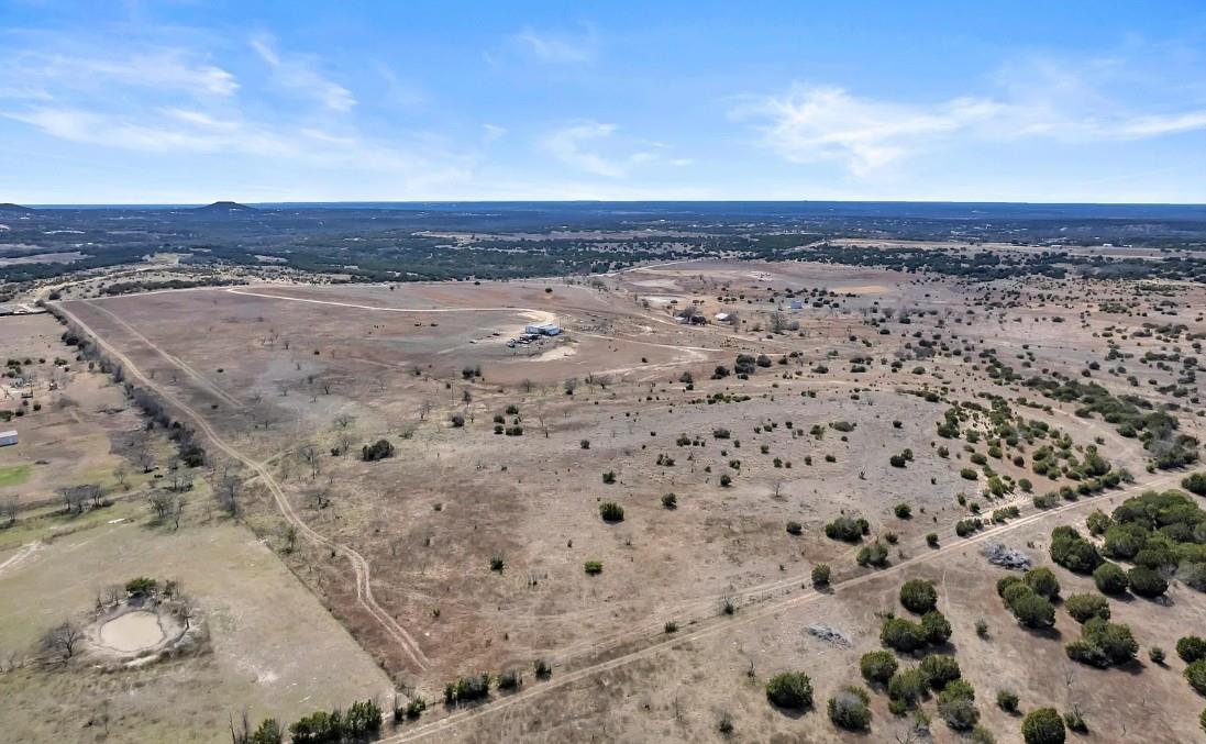 Expansive land parcel featuring natural terrain, 