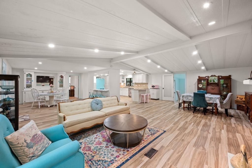 Spacious open-concept interior featuring light-to