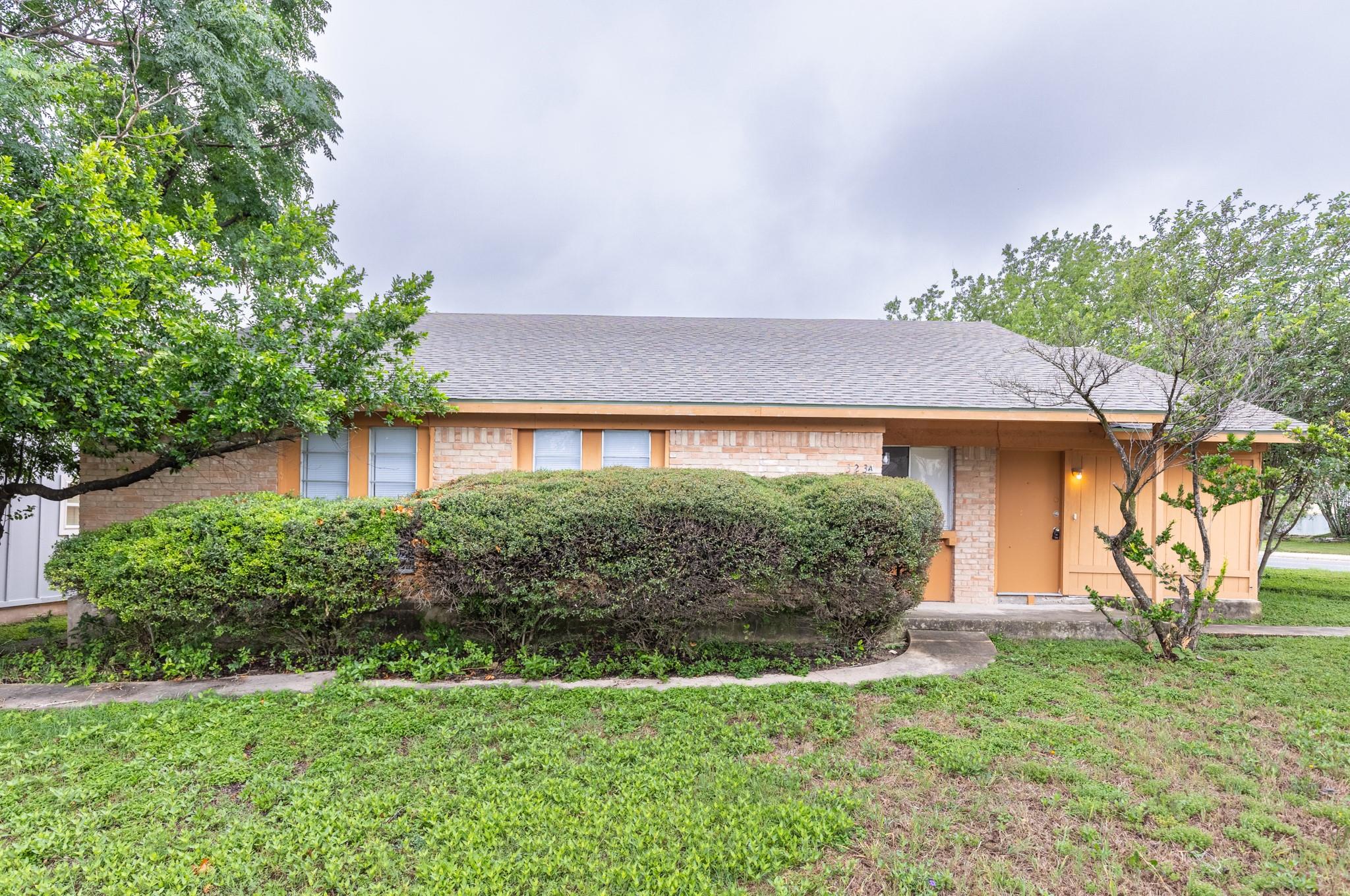 A classic brick exterior offers enduring charm an