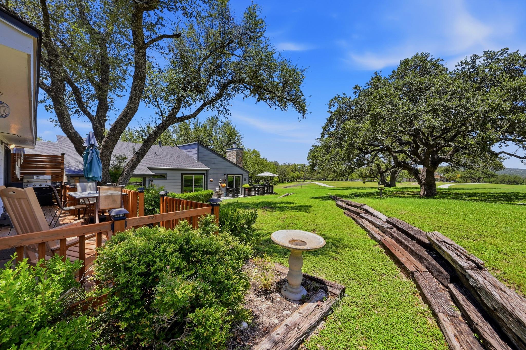 A secluded outdoor living space with a wooden dec