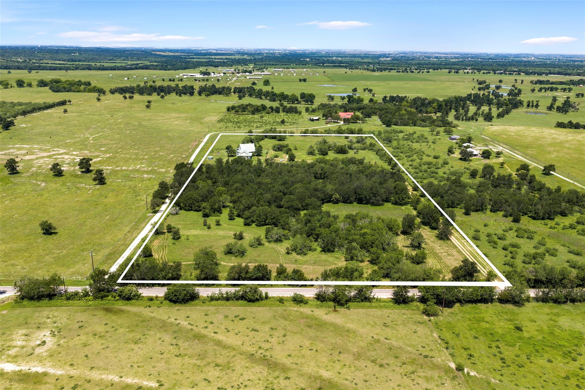 Expansive rural property featuring a mix of open 