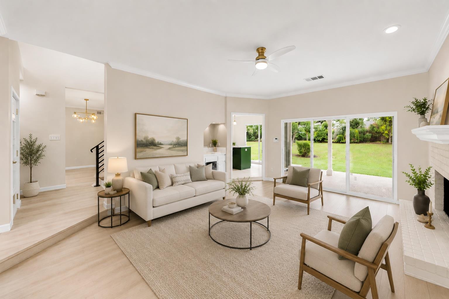 Sliding glass doors open directly to the verdant 