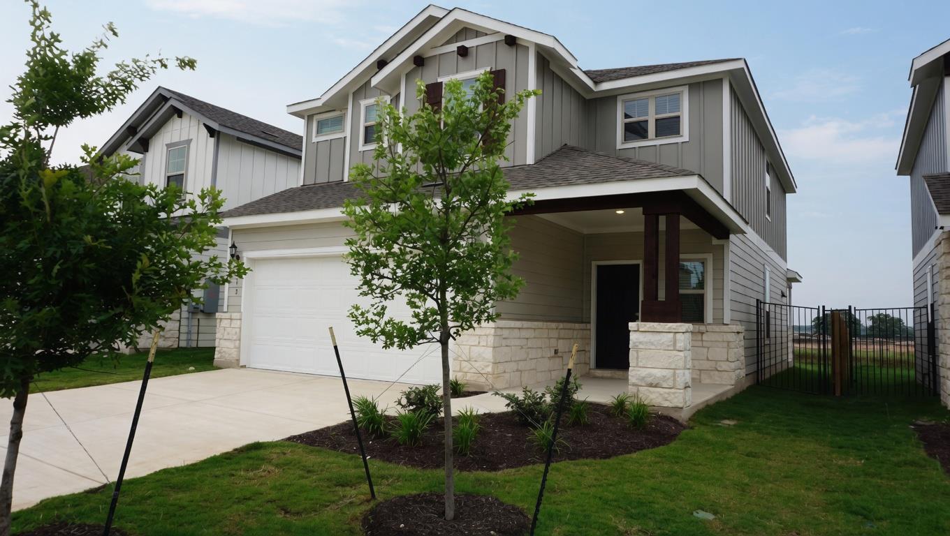 Contemporary two-story residence featuring a mixe
