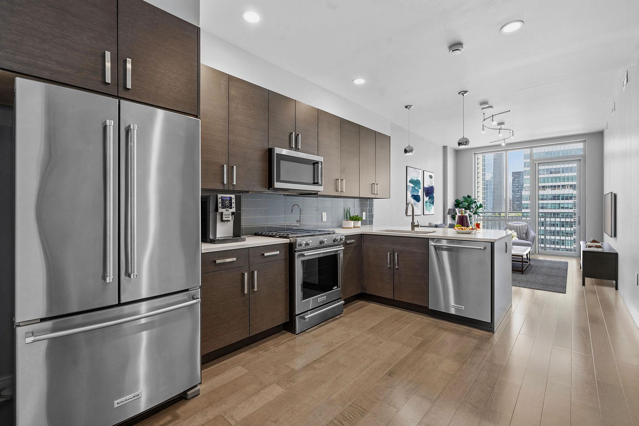 Modern kitchen featuring stainless steel applianc
