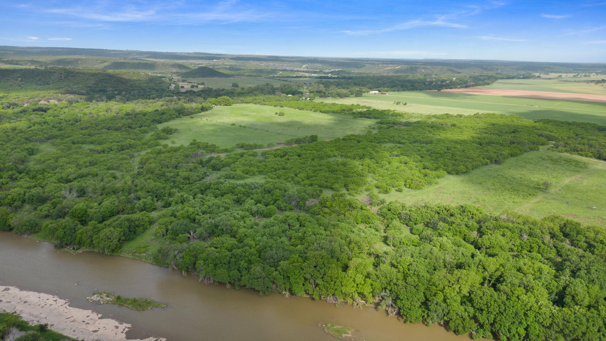 Expansive natural landscape featuring a winding r