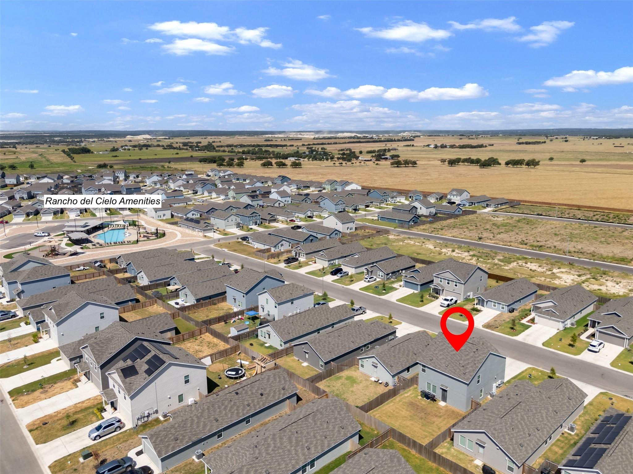 An aerial perspective showcases a modern suburban