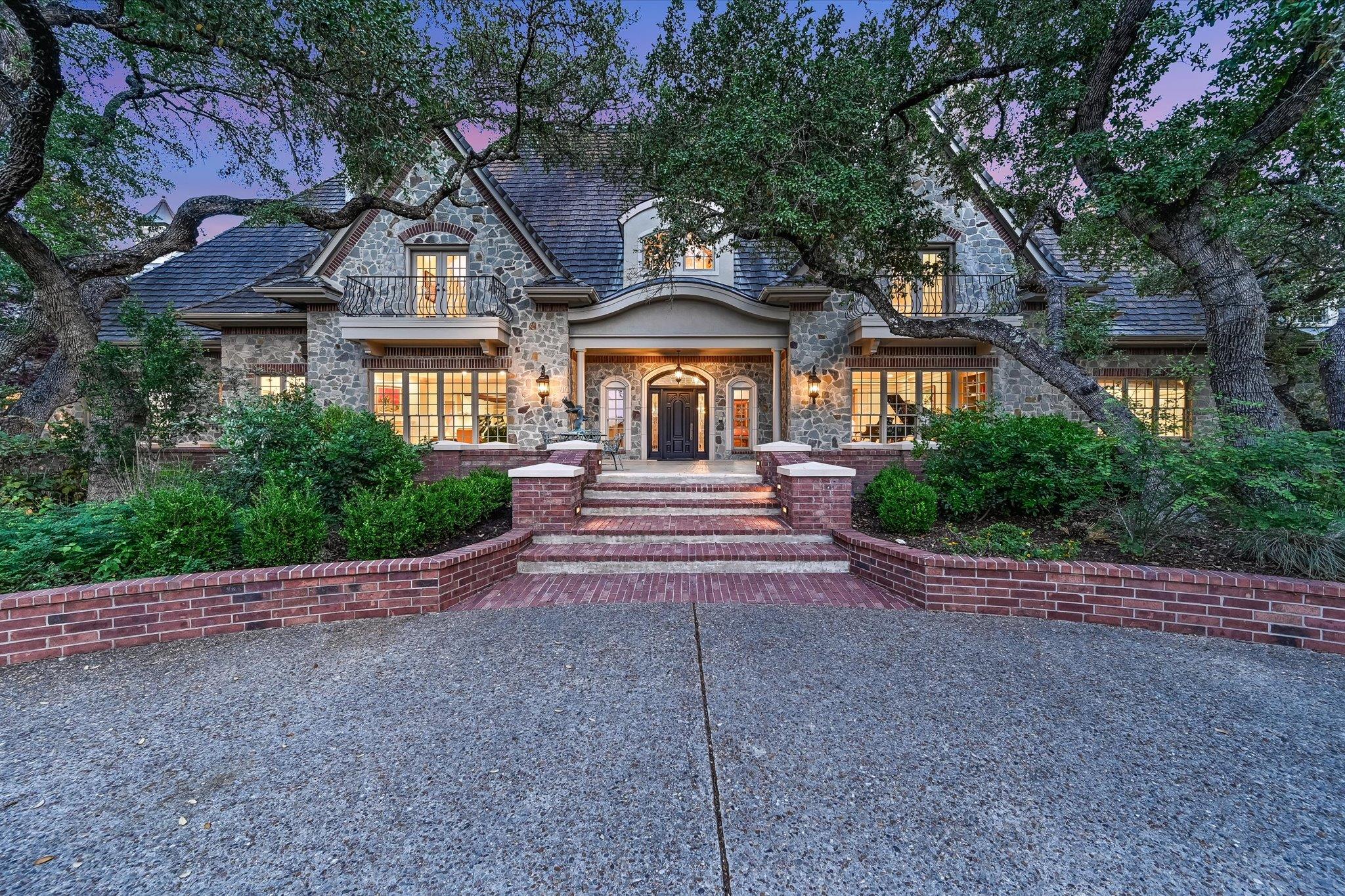 Timeless stone and brick facade welcomes you home