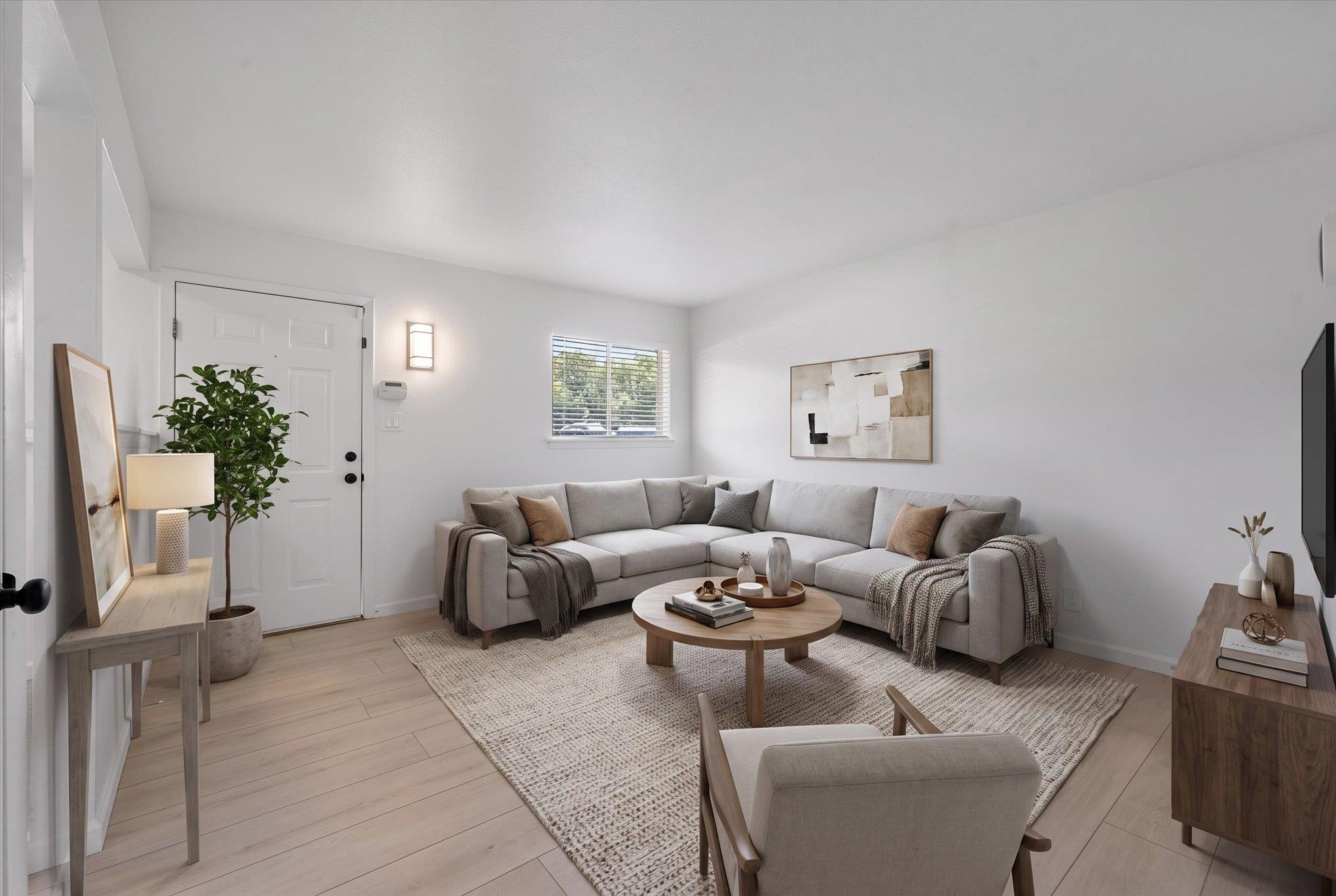 A well-lit, open-concept living space with light 