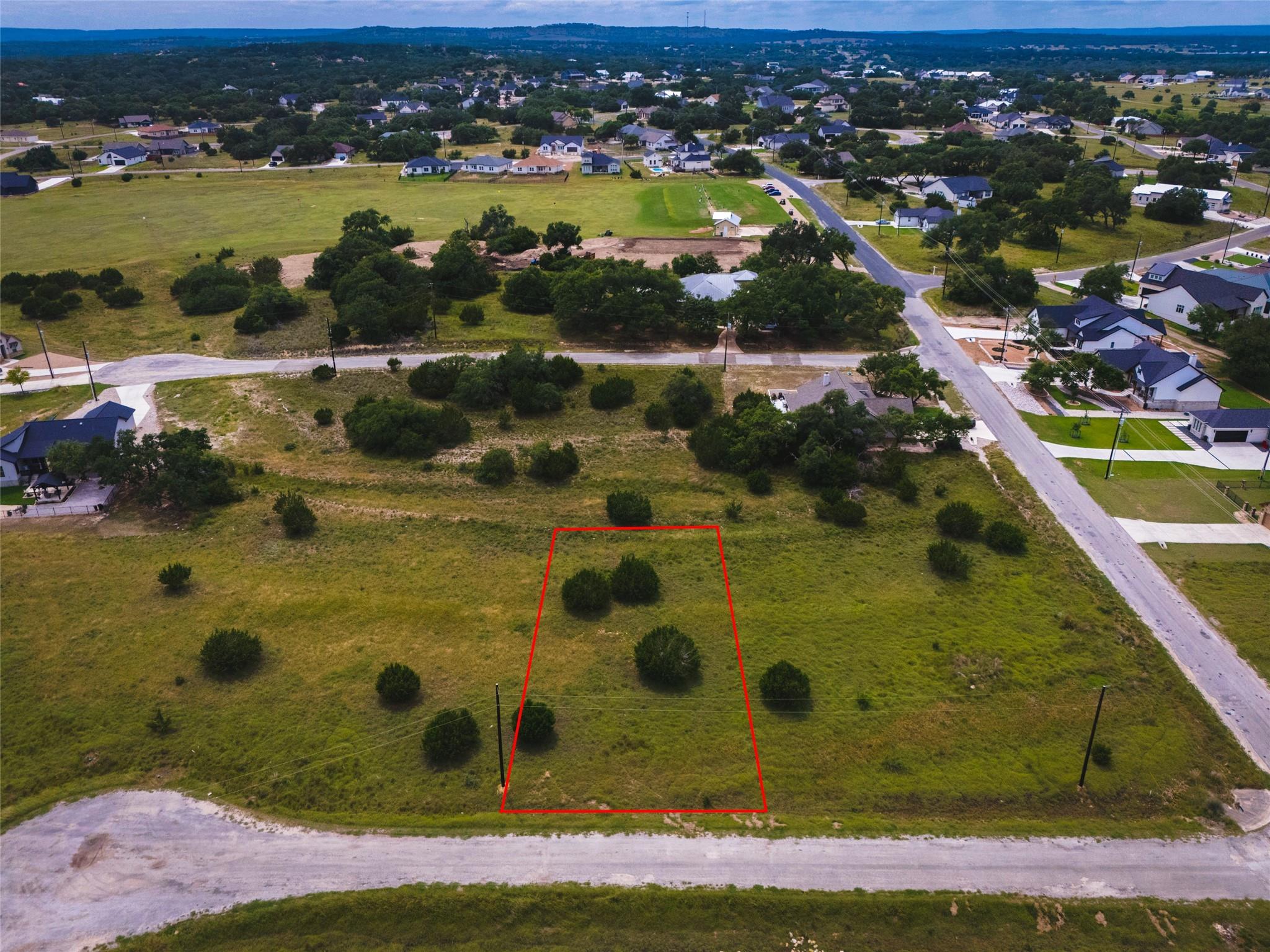 Expansive undeveloped land featuring natural gras