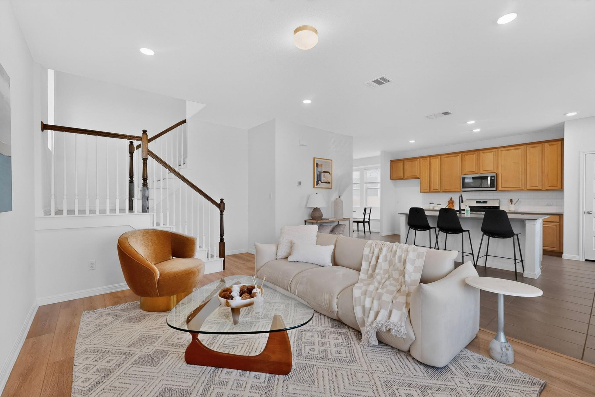 An inviting open-concept living area flows into a