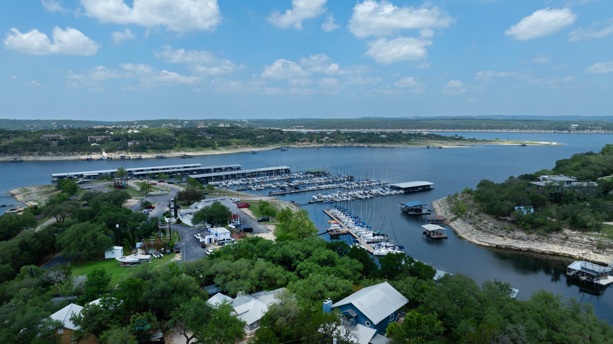 Expansive waterfront property featuring a marina 