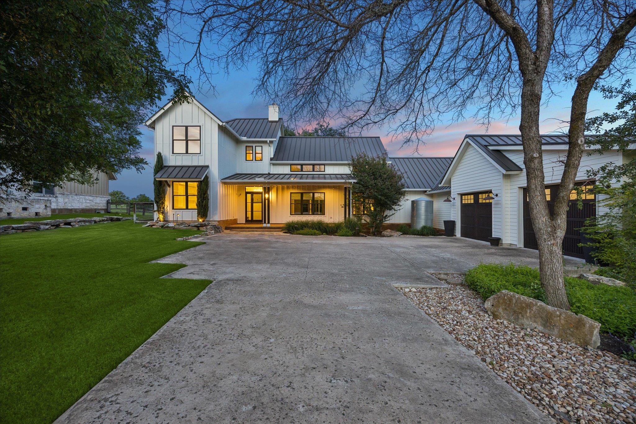 Modern farmhouse-style exterior featuring board a