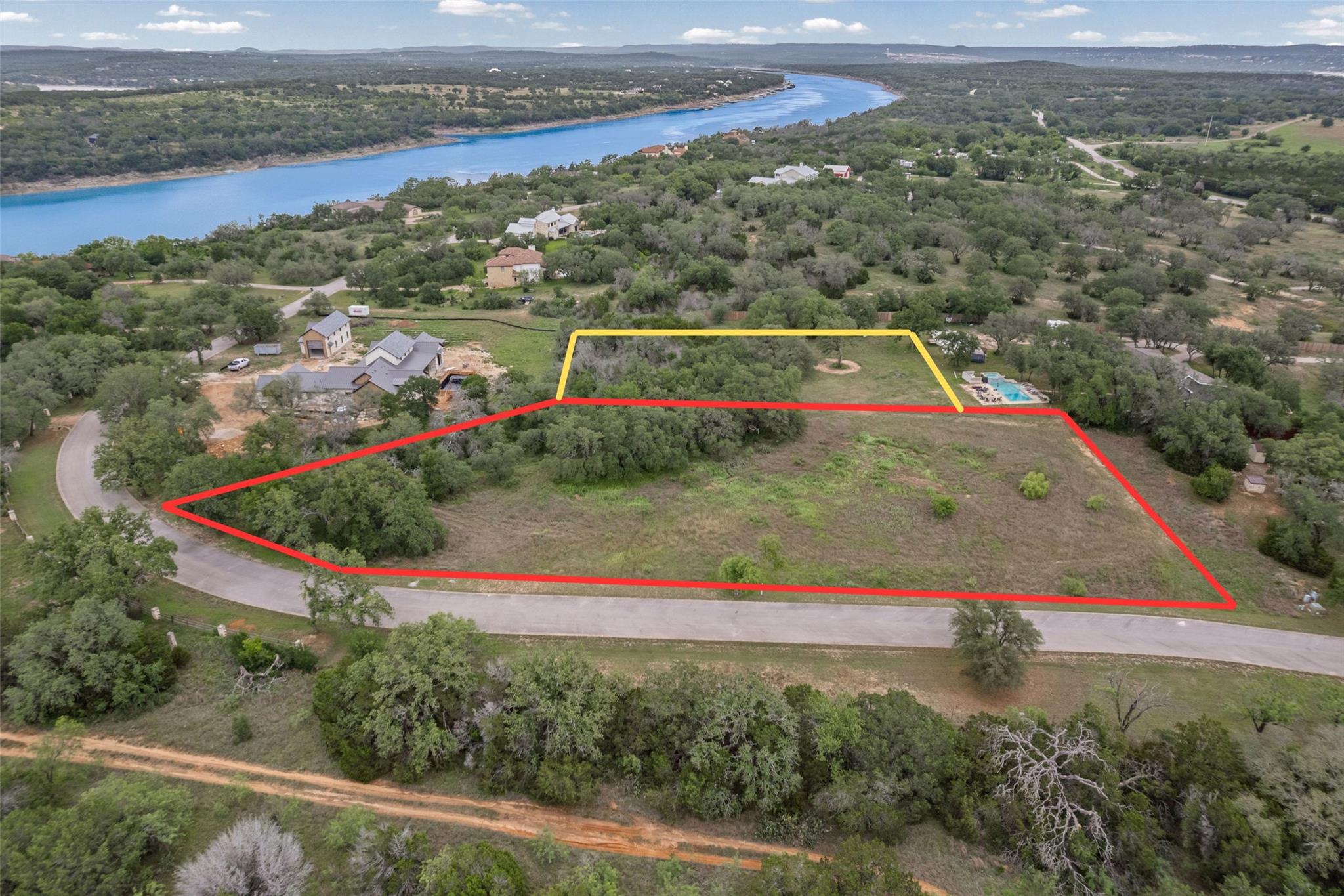 Large undeveloped lot featuring mature trees and 