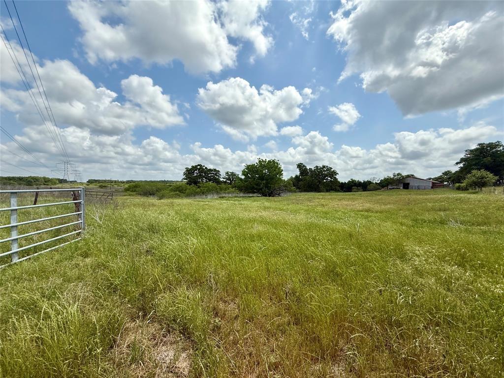 Expansive natural landscape featuring a metal gat