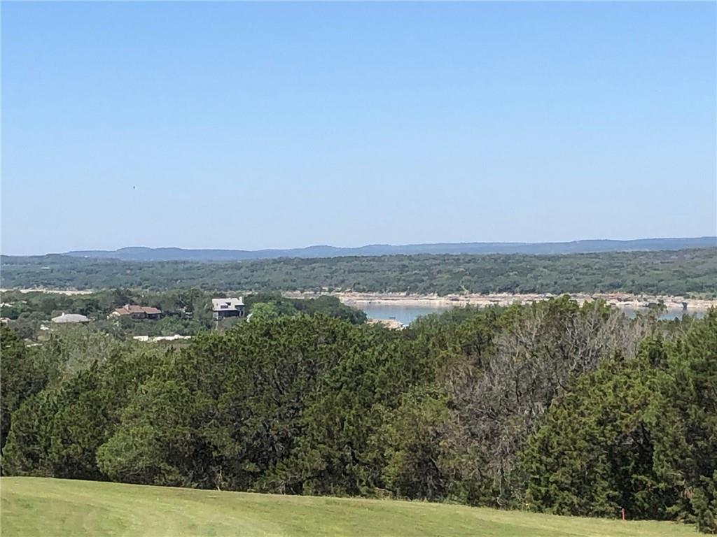 Expansive landscape showcasing a tranquil body of