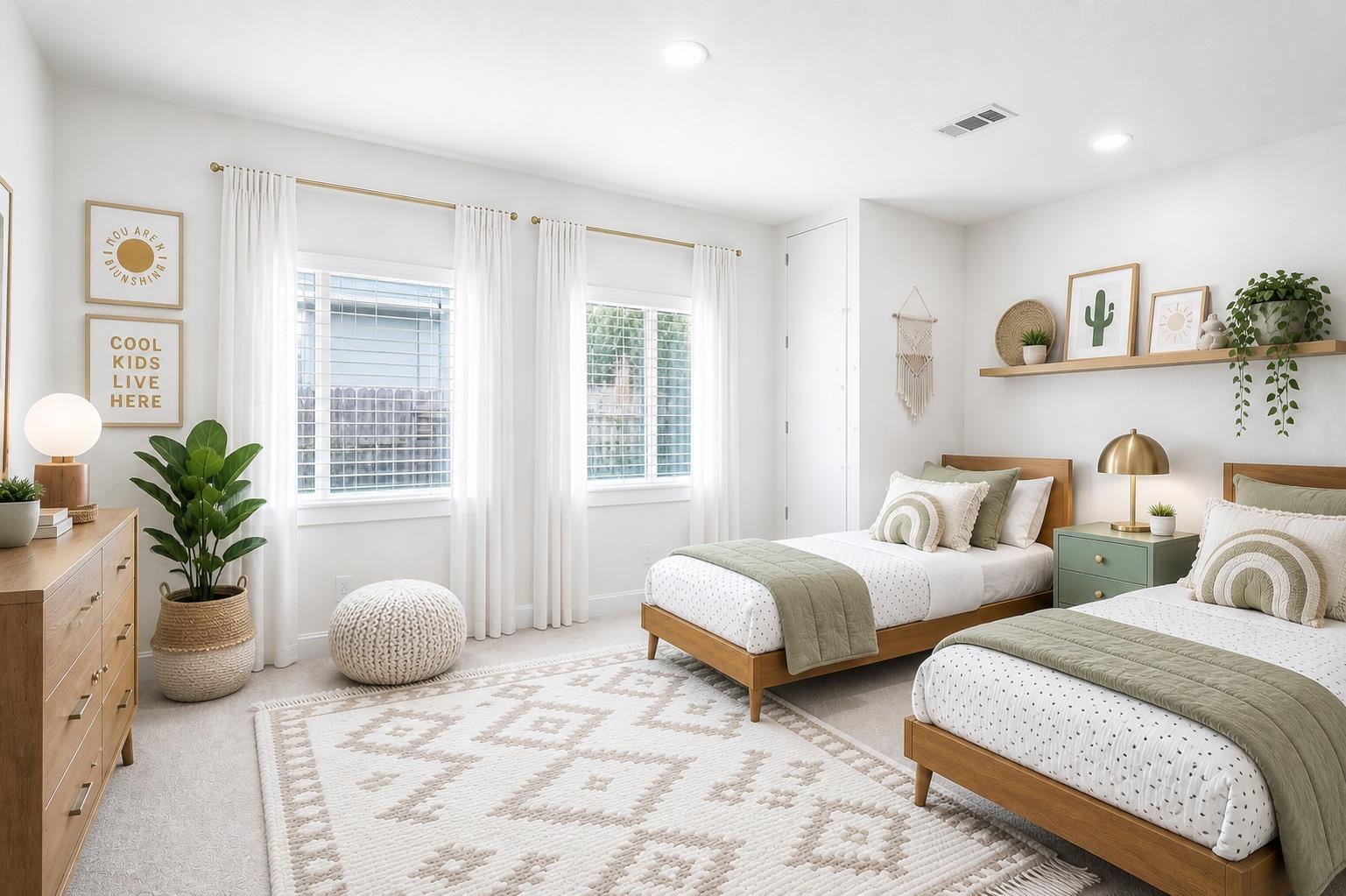 Spacious bedroom featuring light-colored carpetin