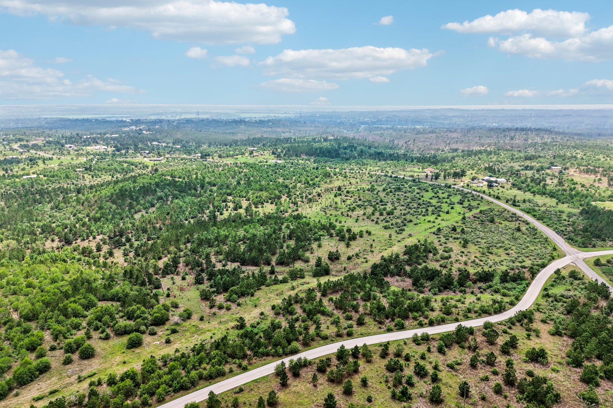 Expansive natural landscape featuring rolling hil