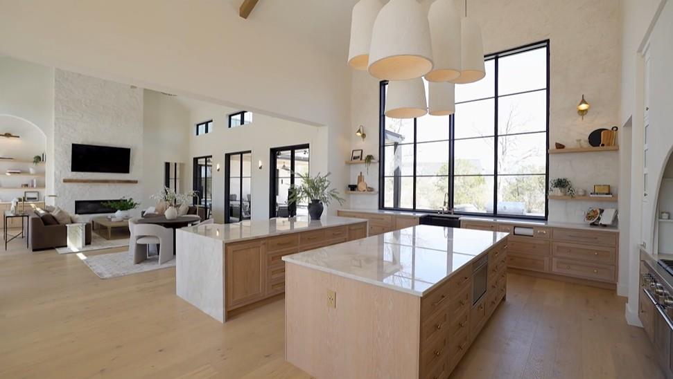 Open concept living area featuring a vaulted ceil