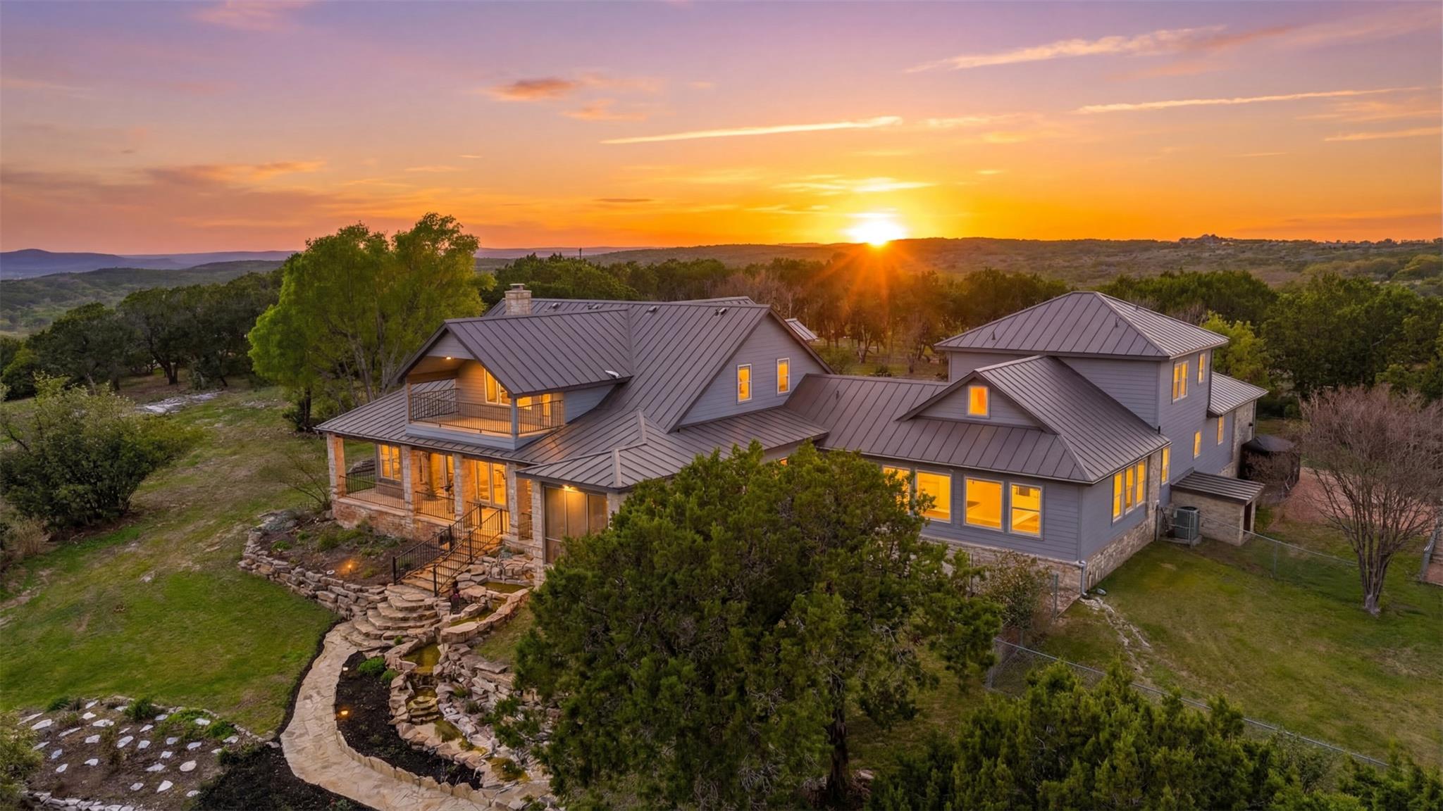 Expansive property featuring a multi-level stone 