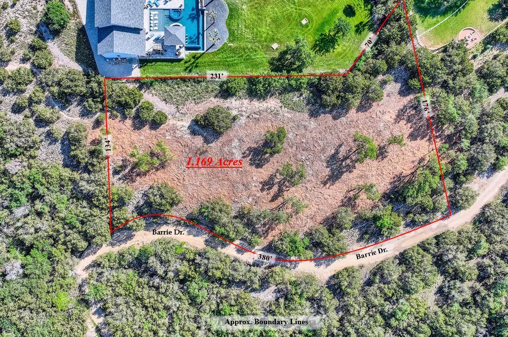 1.169-acre undeveloped lot with mature trees