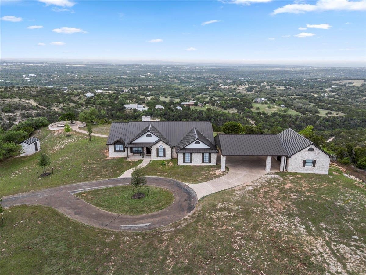 Expansive hilltop residence featuring a dark meta
