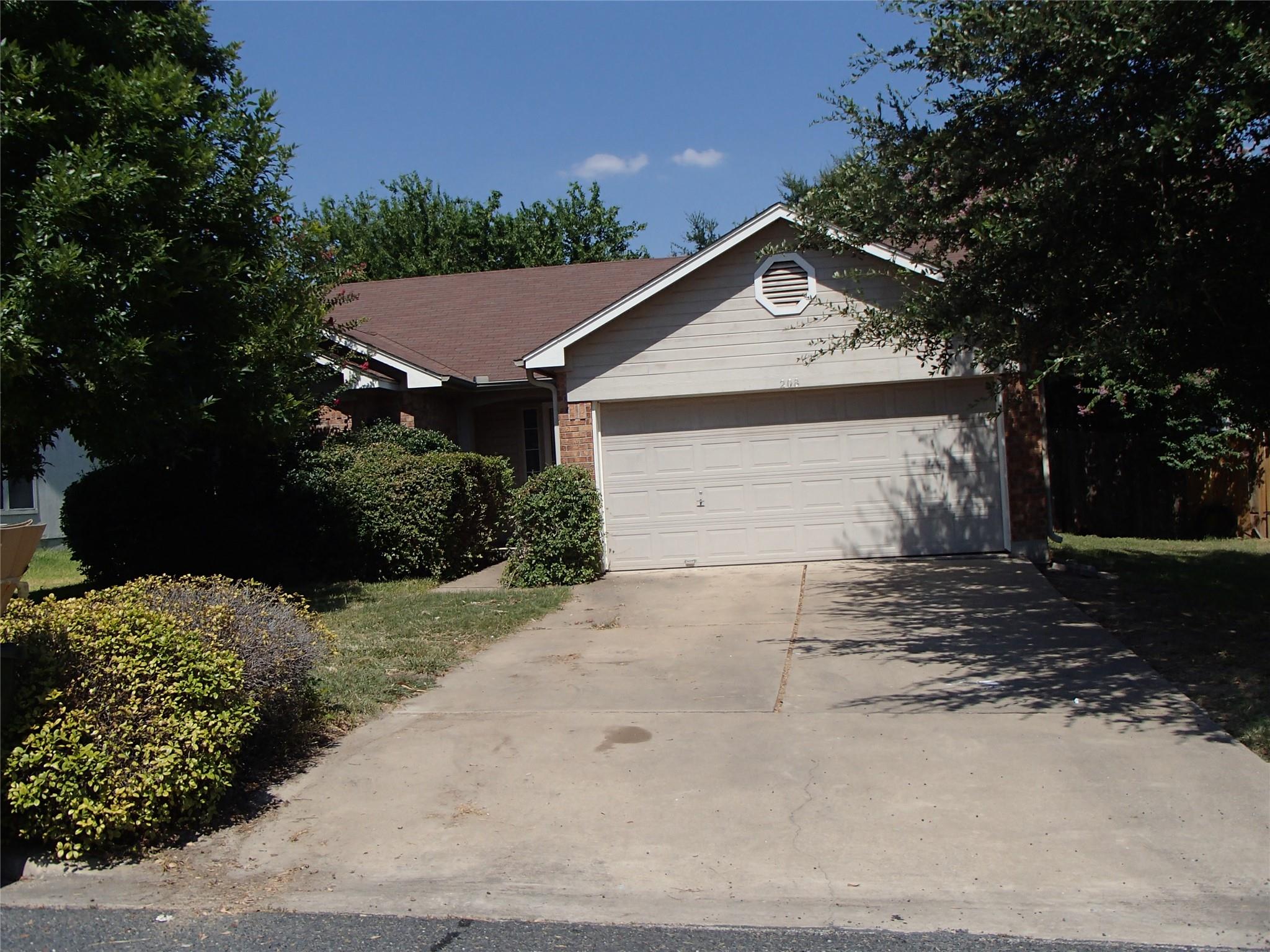Single-story residence featuring a two-car garage