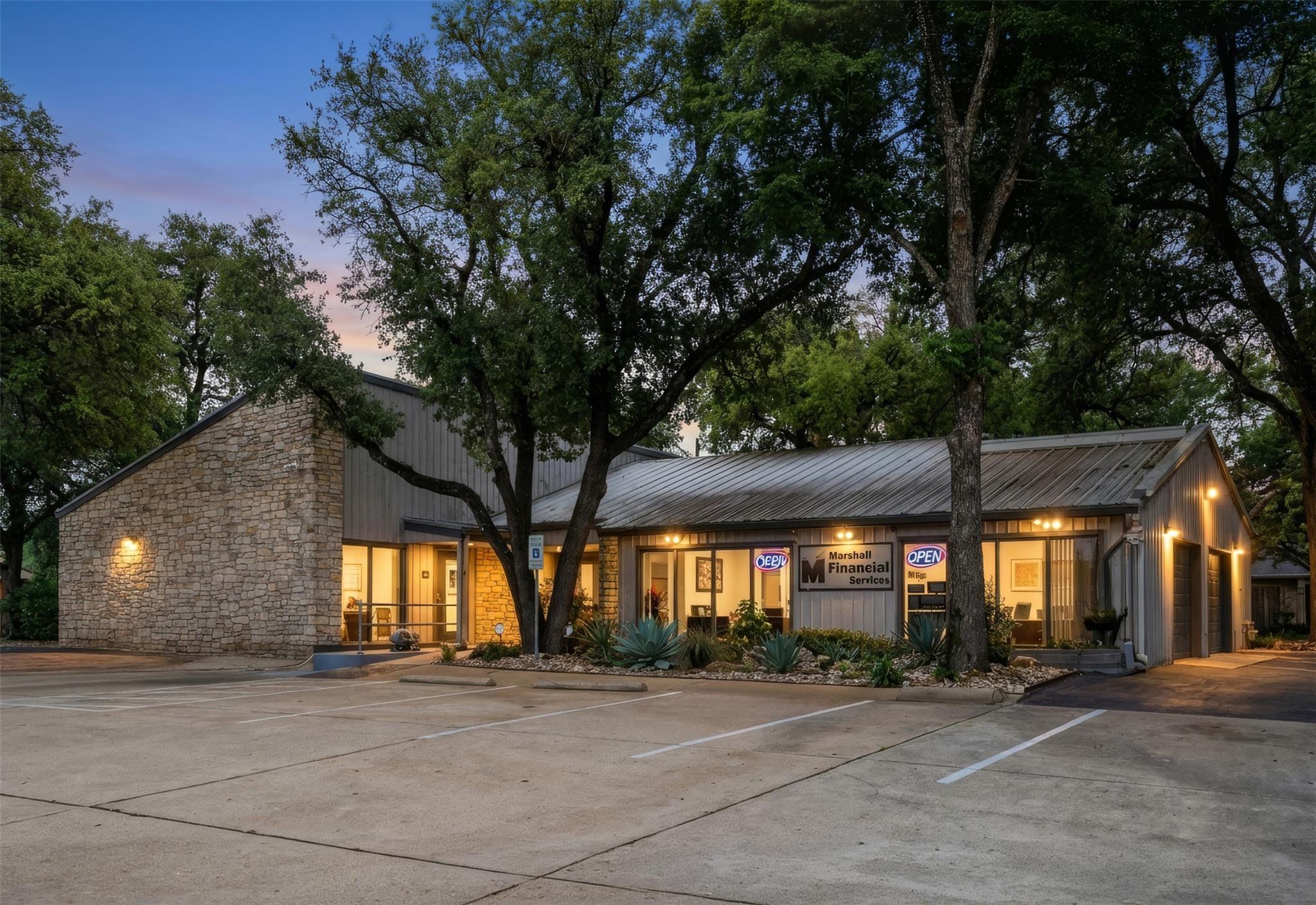 Commercial building featuring a stone and vertica