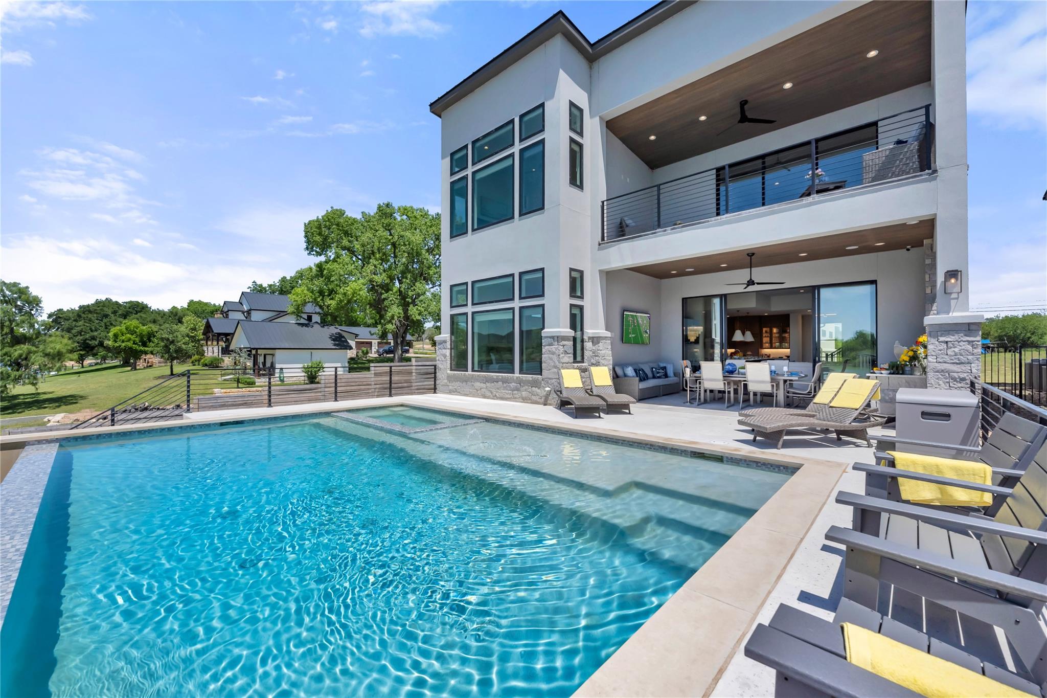 Contemporary exterior featuring a private swimmin