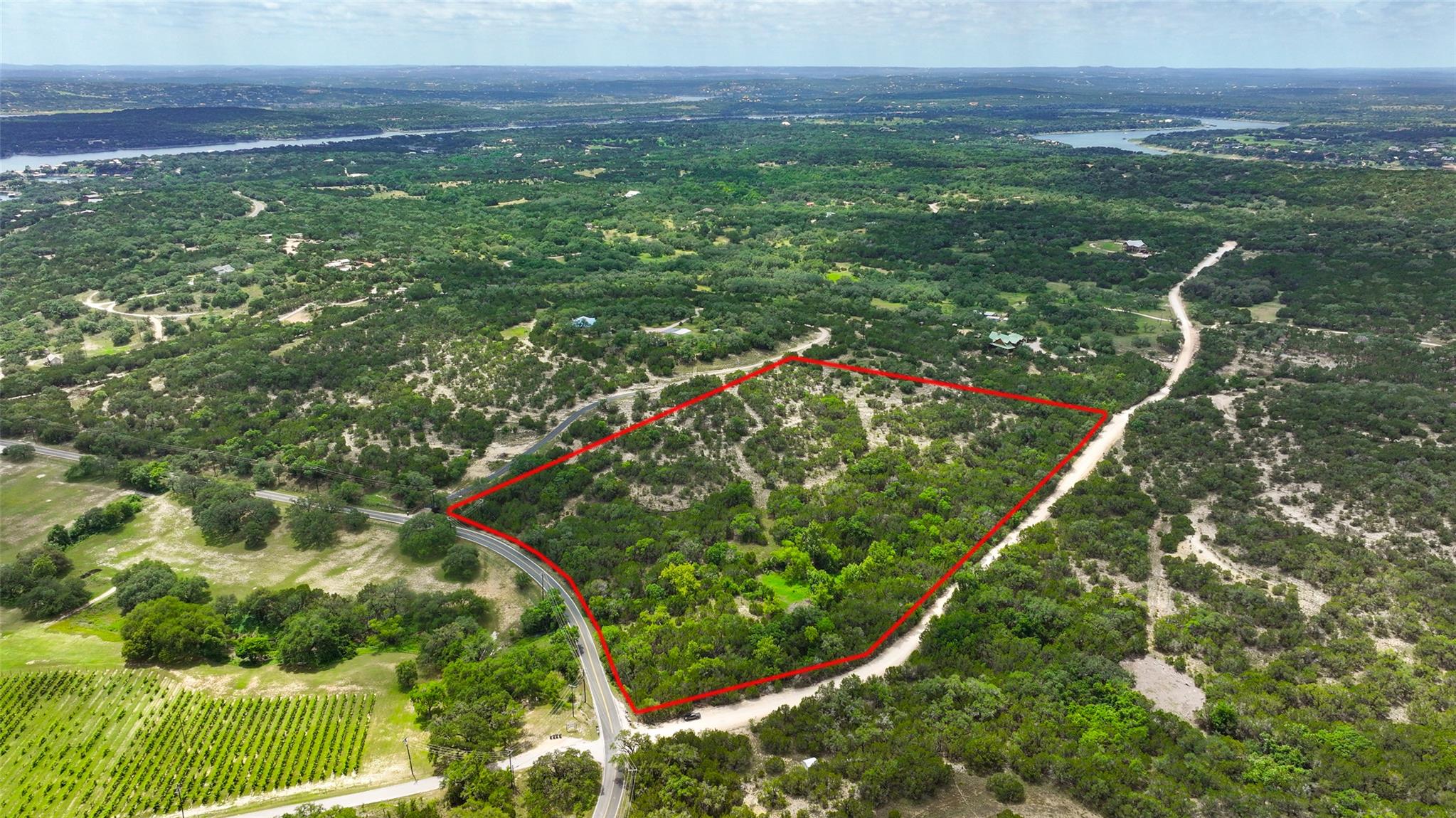 Expansive acreage featuring abundant trees, varie