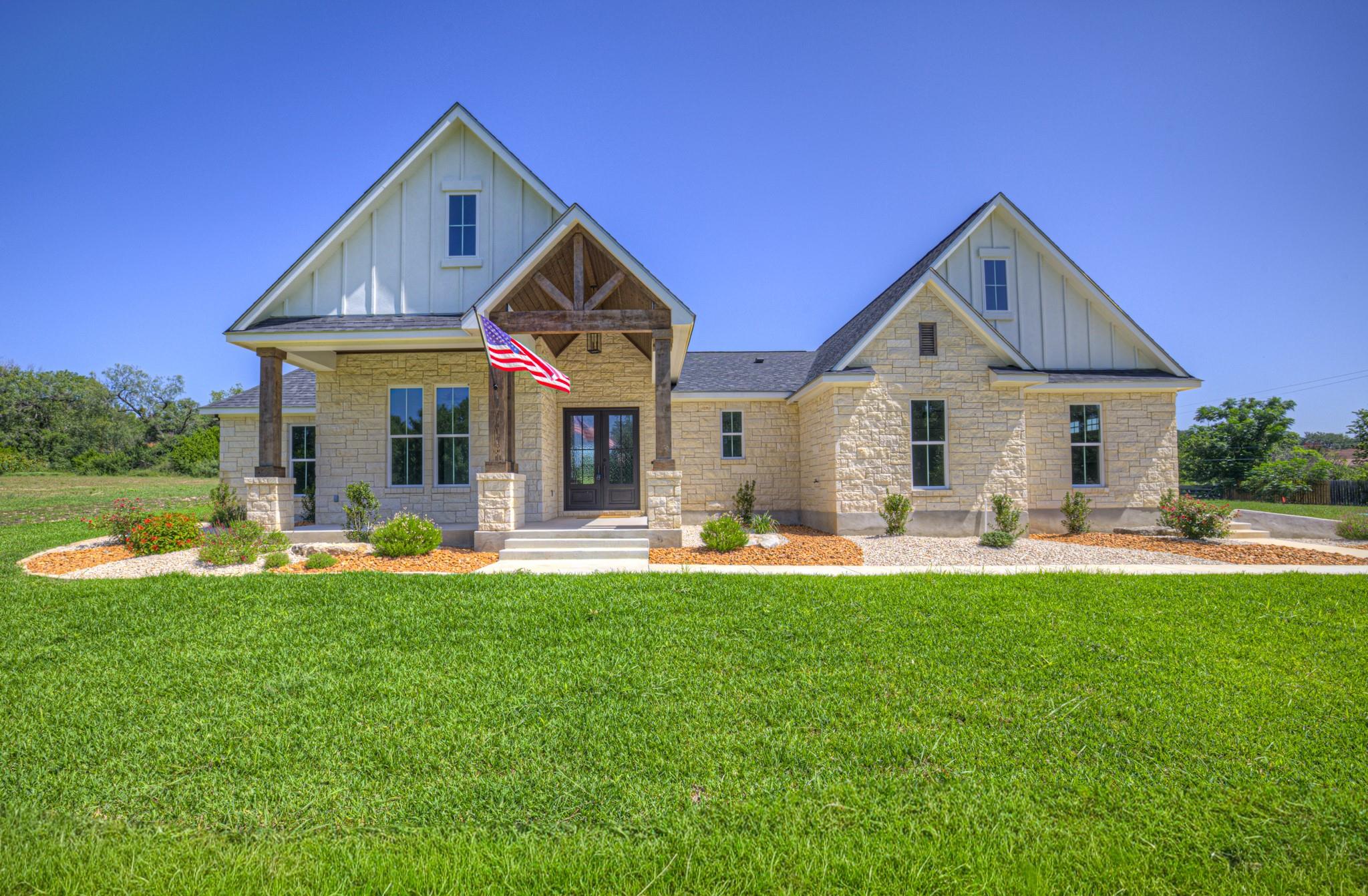 A striking stone facade pairs with modern vertica