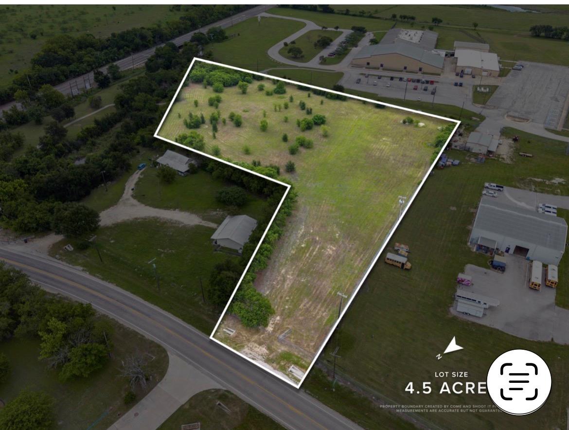 Expansive 4.5-acre lot featuring varied terrain, 