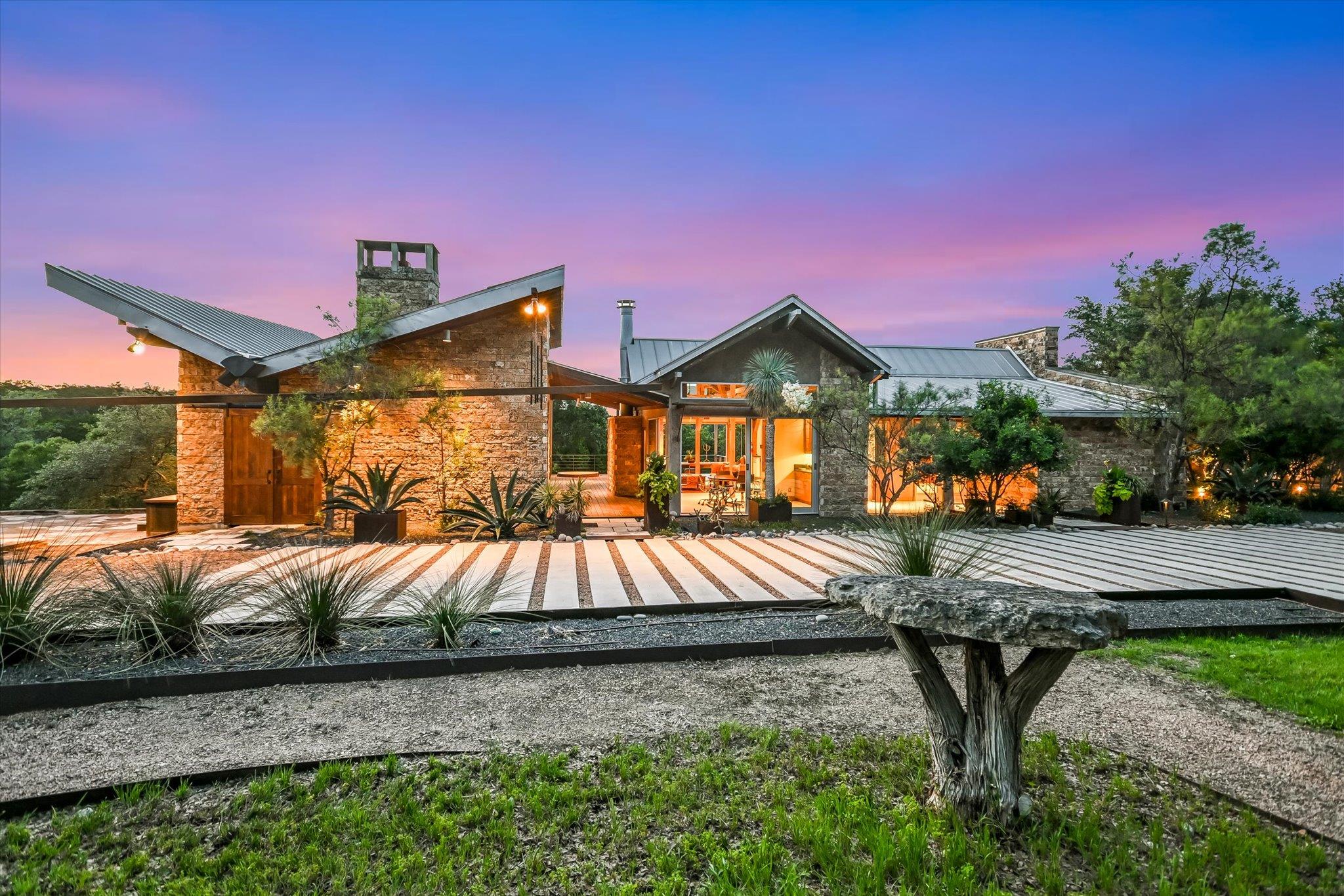 Stone-clad exterior featuring a distinctive archi
