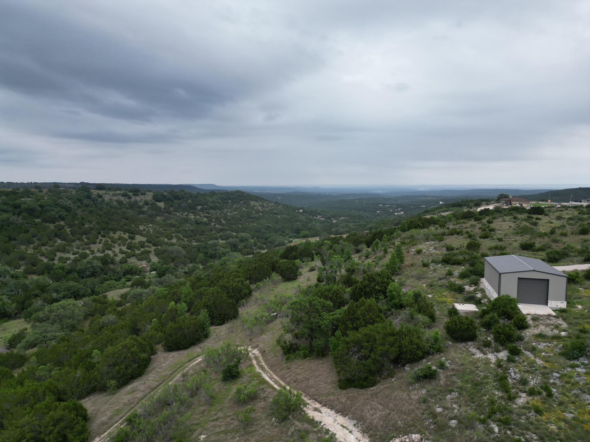 Expansive natural landscape featuring rolling hil